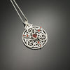 Flower of life geometry pendant with Red Garnets